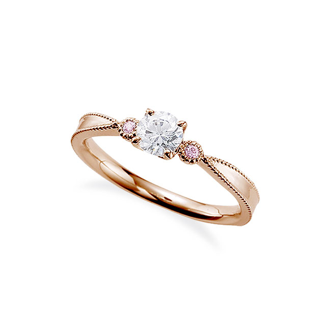 ピンクダイヤモンドの婚約指輪｜リングアームとサイドストーンのまわりにミルグレインを施しアンティークな雰囲気に仕上げたリング