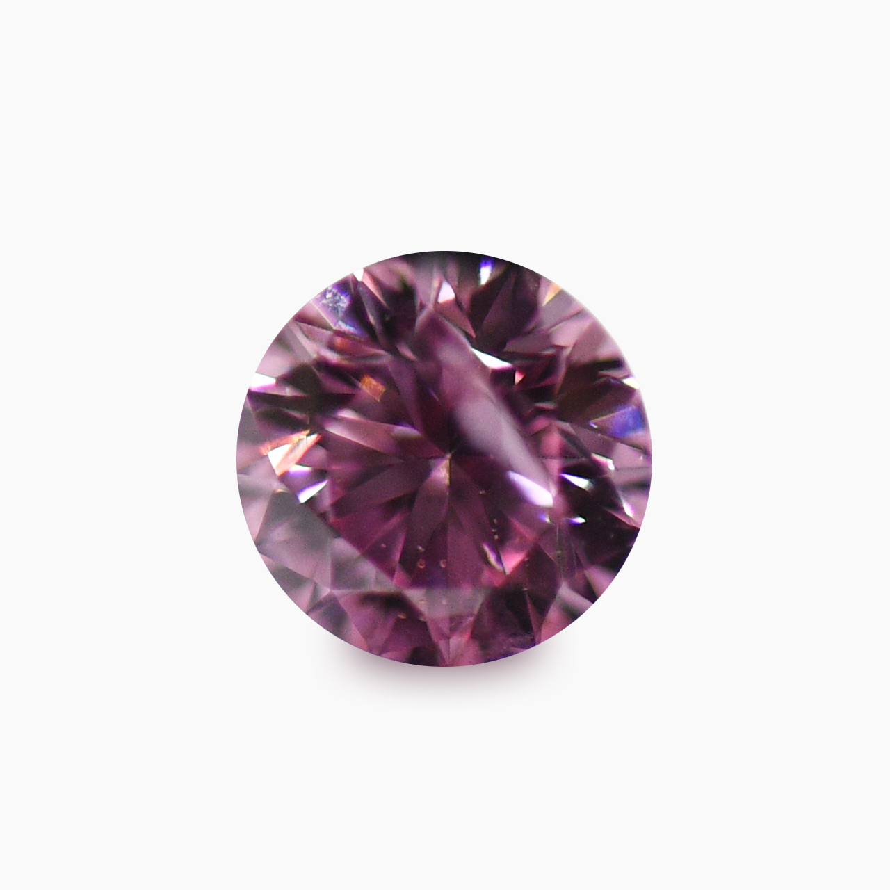 ピンクダイヤモンドルース画像1の拡大画像｜0.097ct / Fancy Intense Purplish Pink / I-1/ Round / CGL